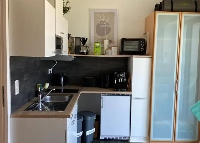 Апартаменты Moderne Naehe Bad Griesbach,